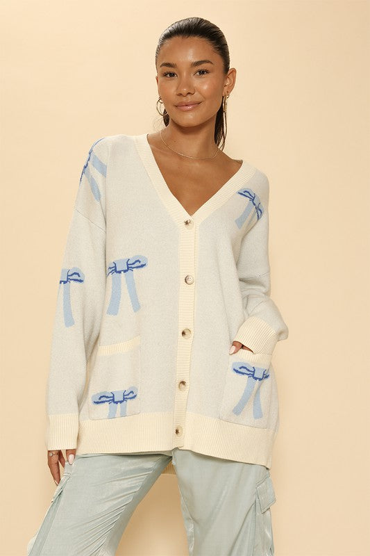 Lucy all over bow knit cardigan Le Papillon Style