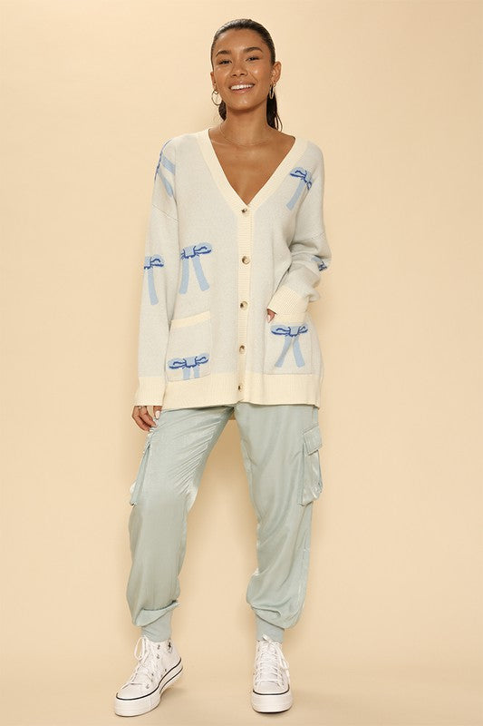 Lucy all over bow knit cardigan Le Papillon Style
