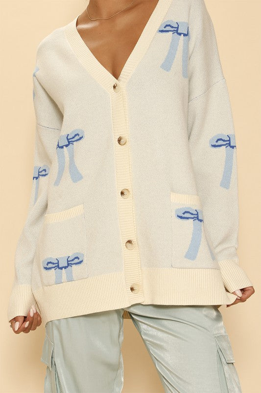 Lucy all over bow knit cardigan Le Papillon Style