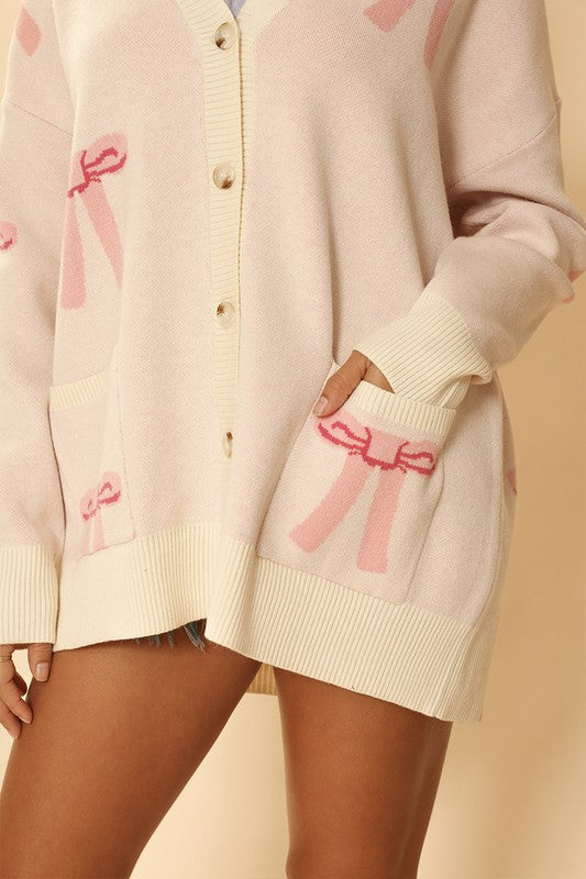 Lucy all over bow knit cardigan Le Papillon Style